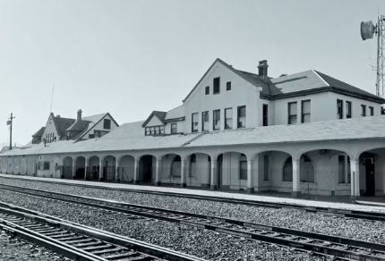 Black and white photo of train station