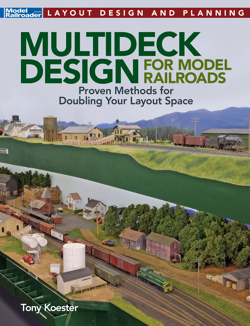 Book cover showing two-deck model railroad.