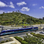 Two-tone blue two-car passenger train