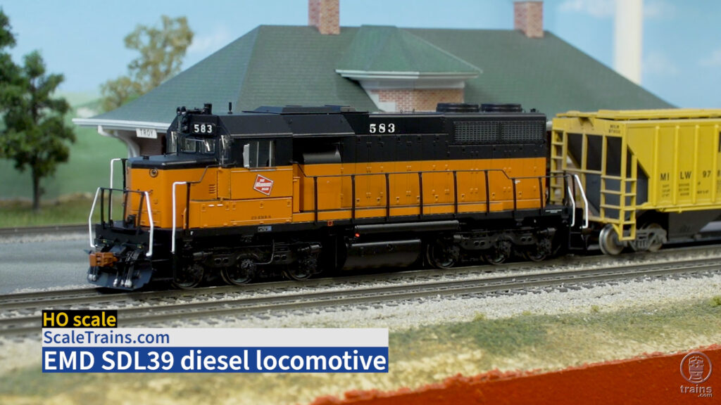 Orange and black diesel locomotive.