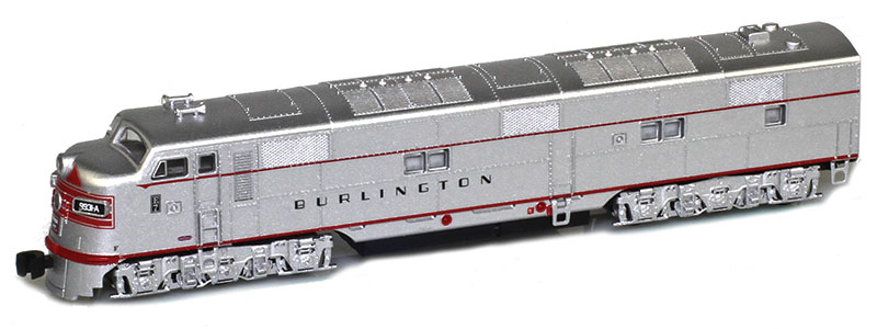 Photo of Z scale Electro-Motive Division E7A diesel locomotive painted silver with red, black, and white graphics.
