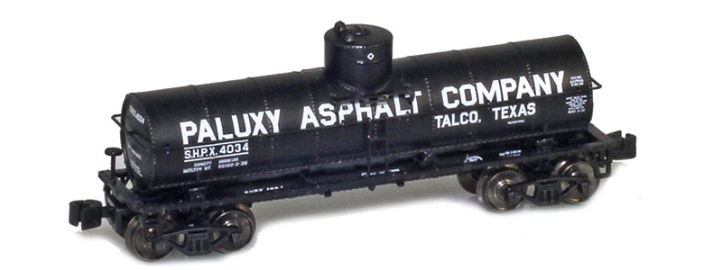 Photo of General American 1917 8,000-gallon tank car painted black with white graphics.