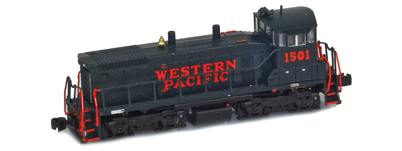 Photo of Z scale Electro-Motive Division SW1500 diesel locomotive painted dark green with orange graphics and safety appliances.