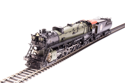 Photo of HO scale steam locomotive painted black with green boiler and red cab roof.