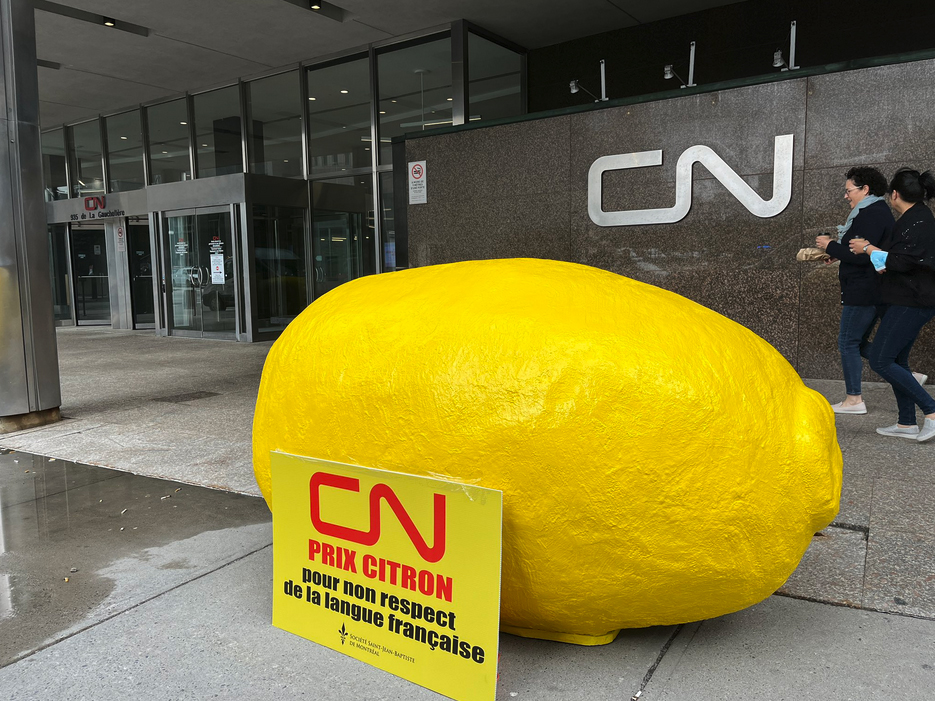 Giant lemon placed in front of building 