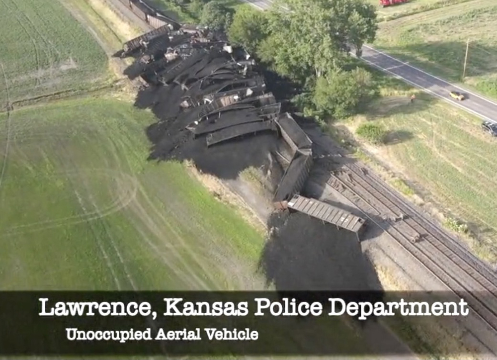 Aerial view of derailed hoppers and spilled coal