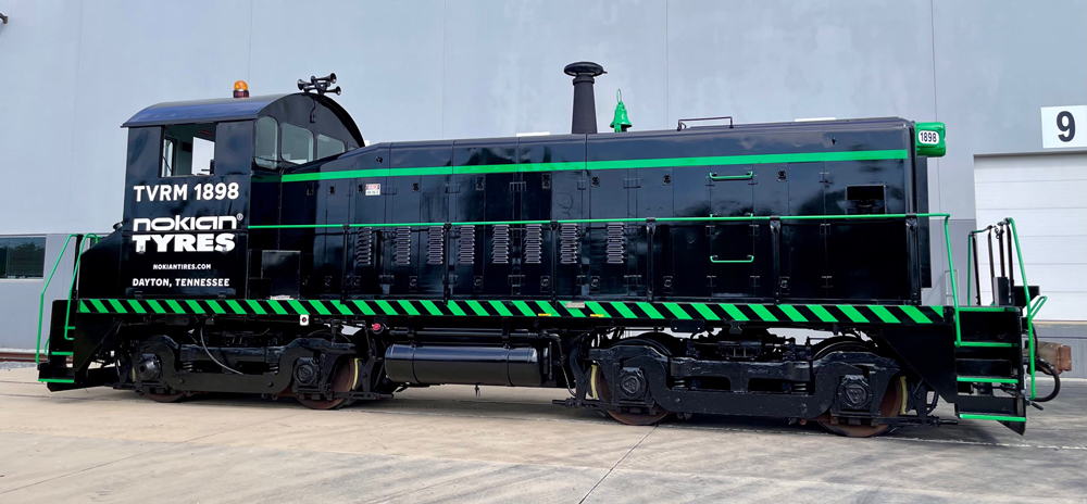 Black end-cab switcher with green striping