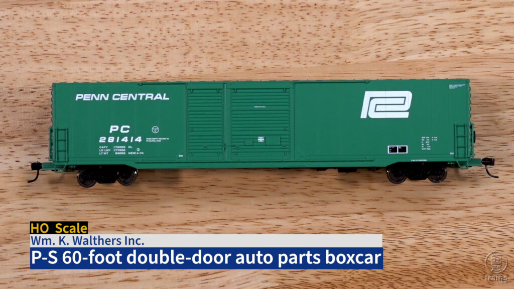 Screen capture of HO scale boxcar on wood workbench.