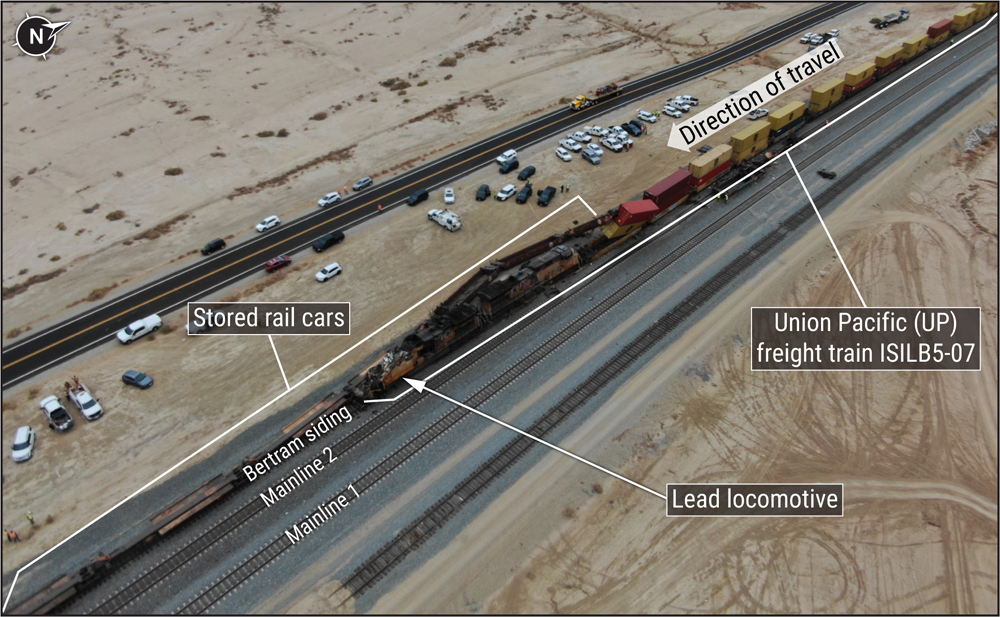 Aerial view of collision between Union Pacific train and railcars on siding