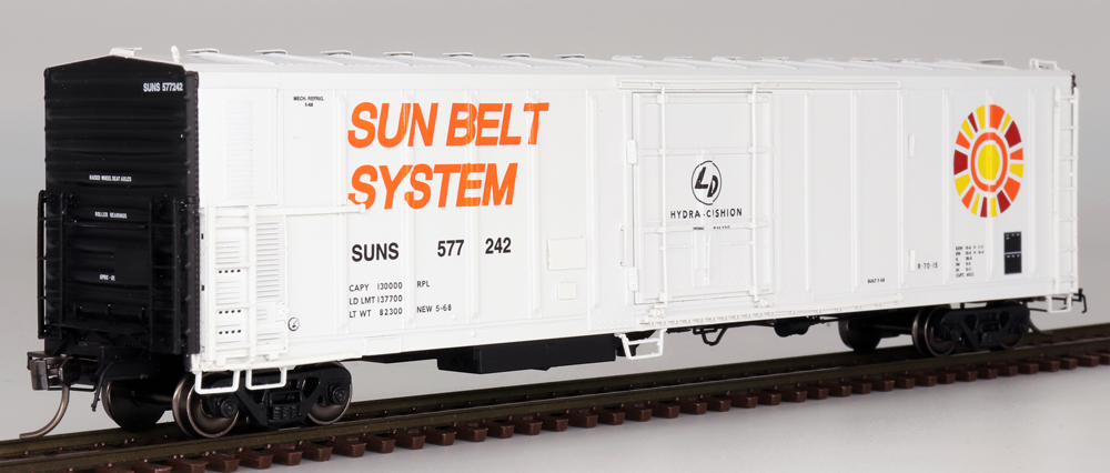 White boxcar with orange "Sun Belt System" logo on it