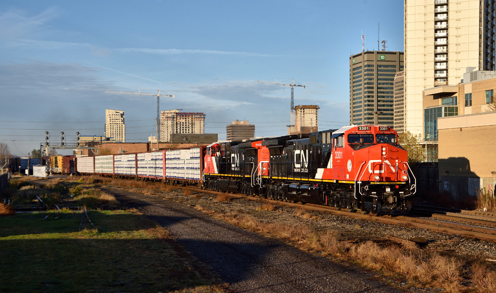 Shiny new read and black locomotives on freight train