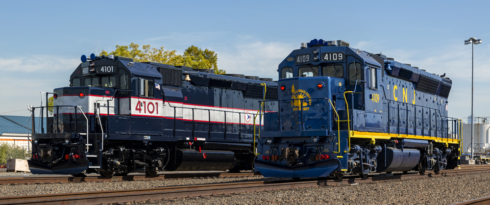 Two GP40 locomotives in heritage paint schemes
