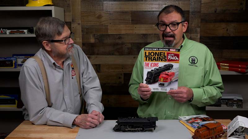 Bob Keller and Hal Miller discuss train repair parts