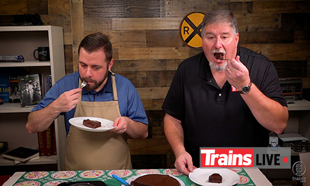 two guys eating Trains LIVE — Amtrak-inspired flourless chocolate torte