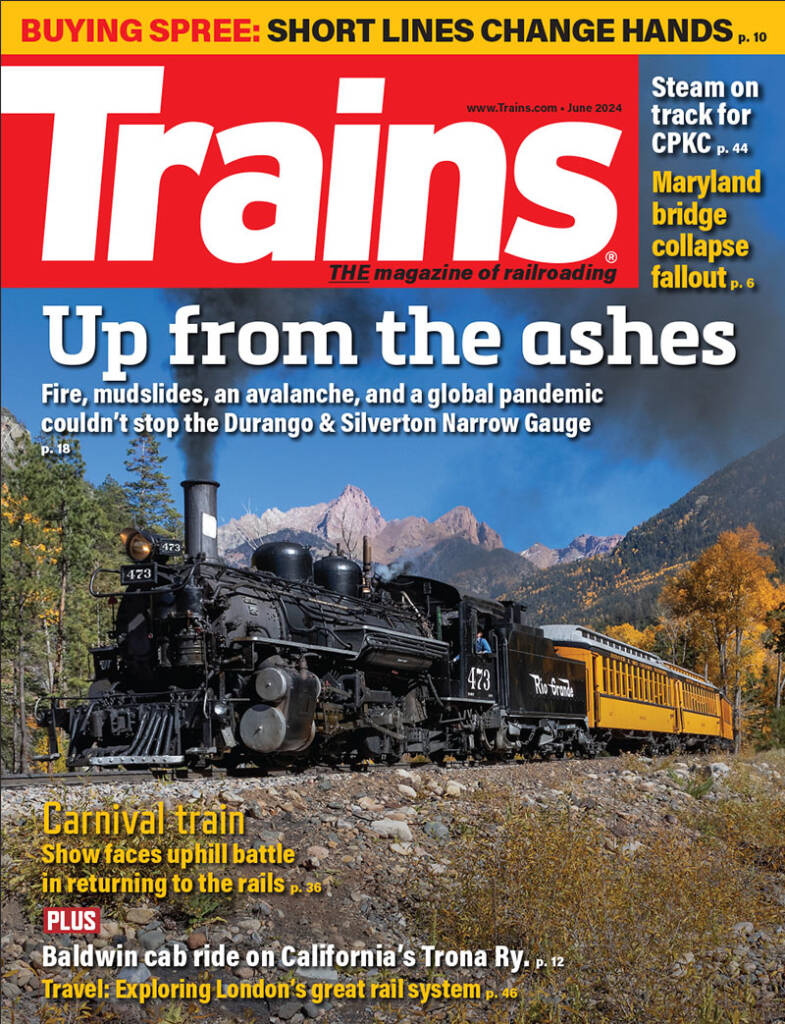The June 2024 cover of Trains magazine, featuring a steam locomotive and tender with text which reads" Up from the ashes"