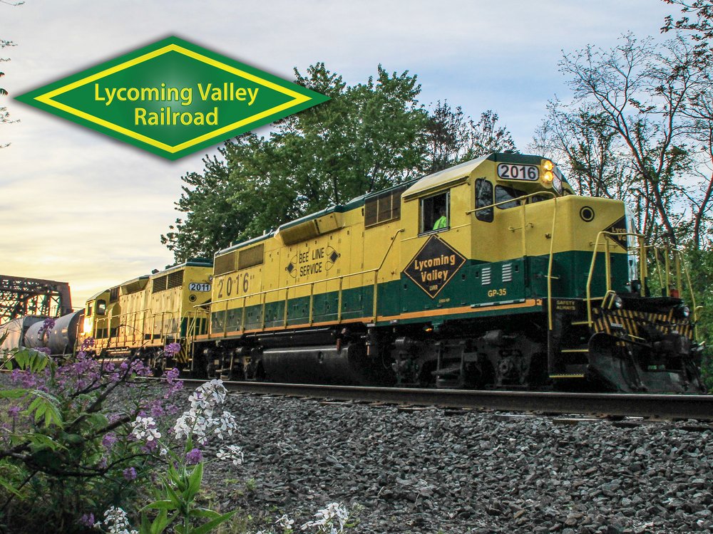Lycoming Valley Railroad logo with freight train in the background.