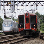 Amtrak high speed train meets Metro-North electric multiple-unit trainset