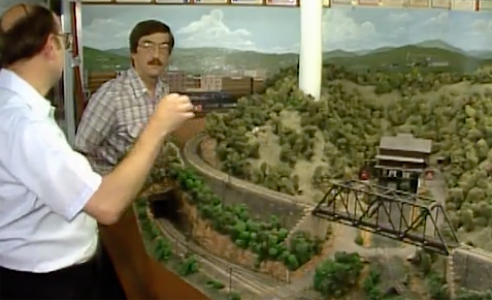 Model Railroader Video Vault highlights: An image of two men standing in front of a model railroad layout