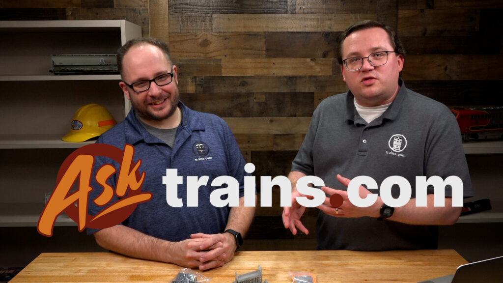 Ask Trains.com compilation part two April 2023: An image of two men standing behind a table