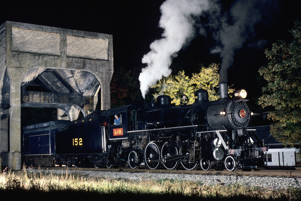 Steam locomotive running at night
