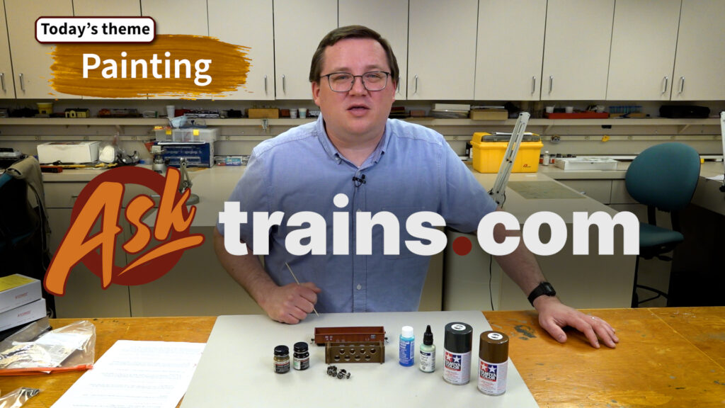Ask Trains.com May compilation: An image of a man standing behind a workbench