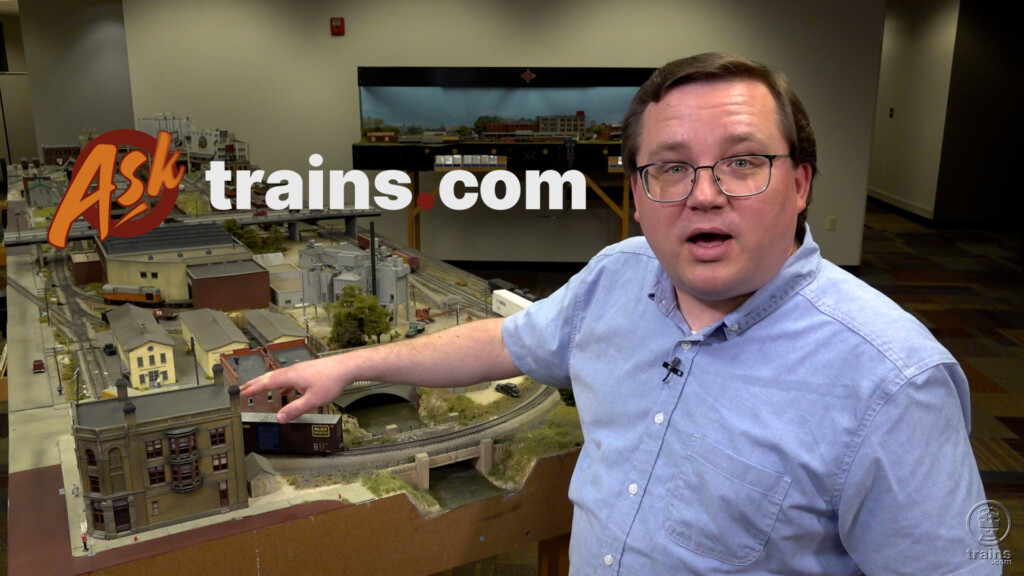 Ask Trains.com May compilation two: An image of a man standing next to a model train layout