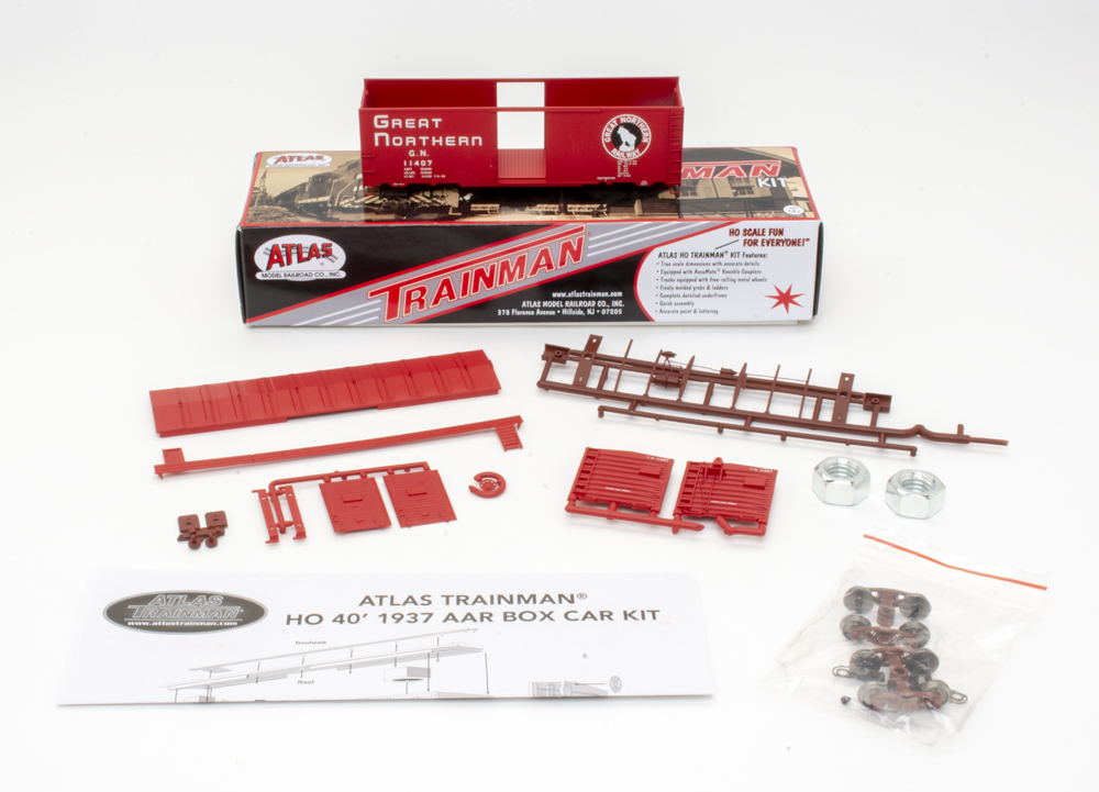 Color photo showing HO scale boxcar kit with components.