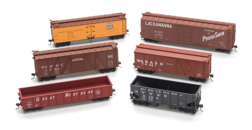 Color photo showing six assembled HO scale Accurail models.