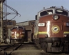 Gray-and-maroon streamlined diesel Algoma Central locomotives