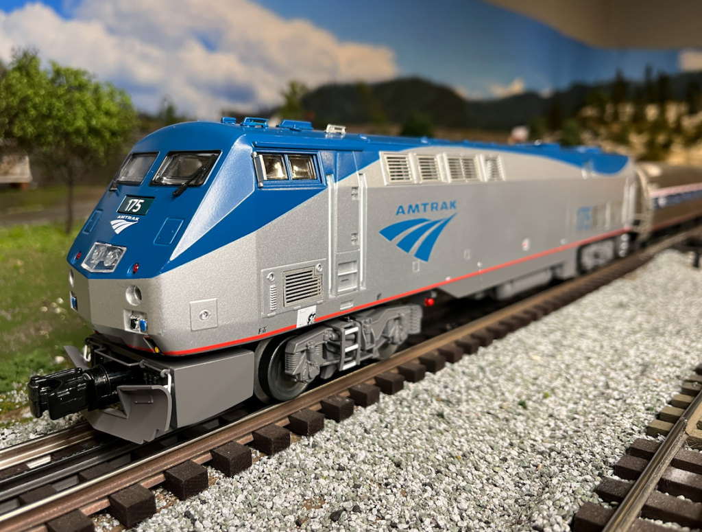 blue and silver model locomotive