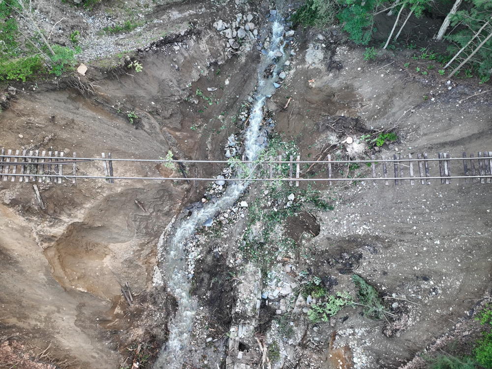 Overhead view of tracks dangling over washout