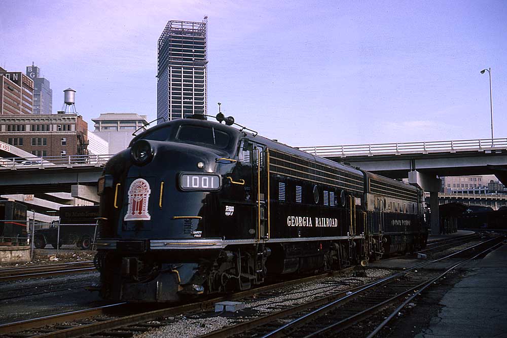 Dark blue streamlined Georgia Railroad diesel locomotives