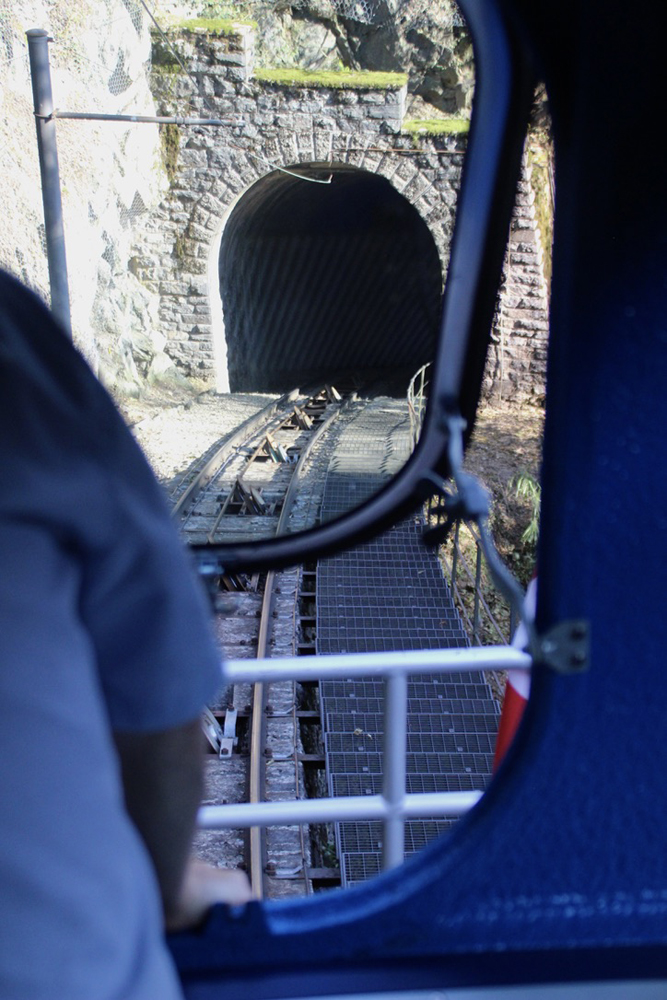 View of tunnel through front window of funicular car