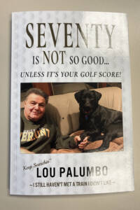 man and dog on cover of book