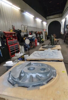 Shop facility with castings on tables