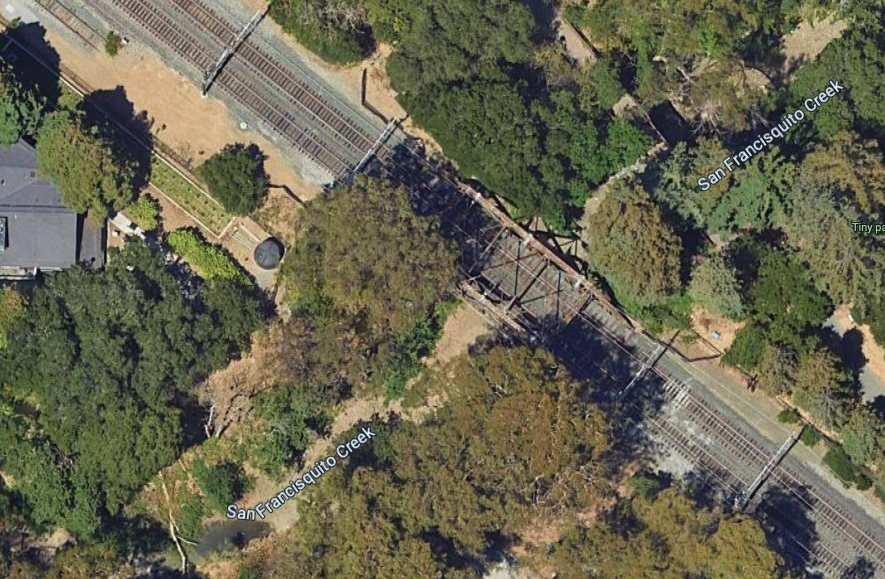 Aerial view of bridge surrounded by trees