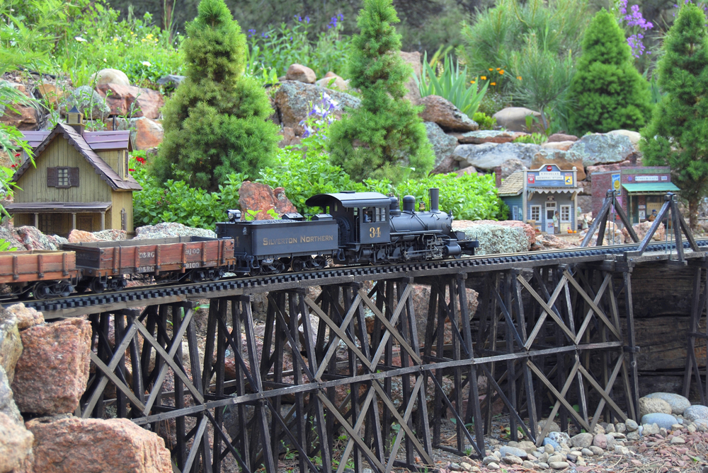 model train on wooden trestle