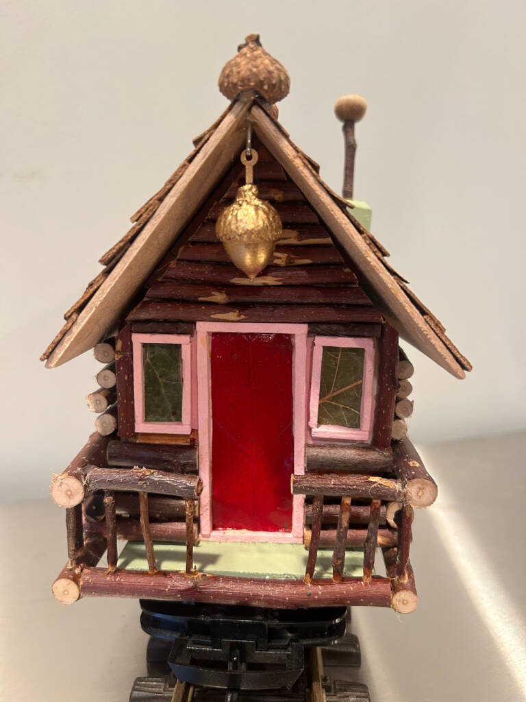 model house with red door