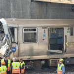 Stainless steel railcar with smashed-in front end