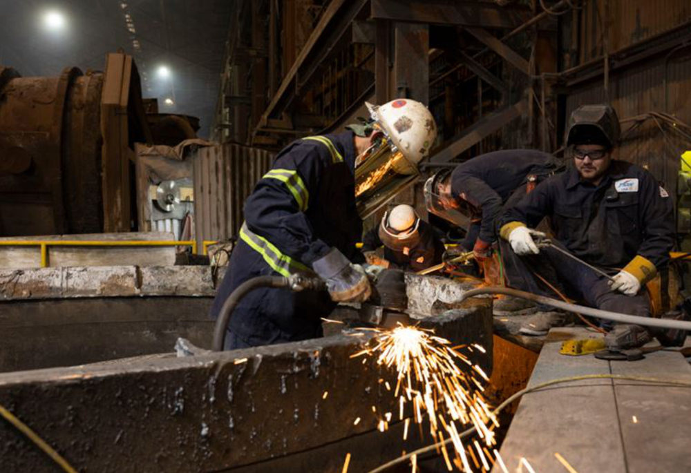 Men working in steel plant