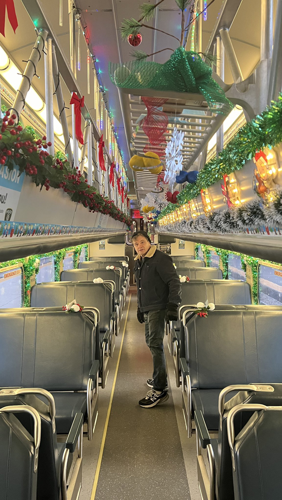 Man in decorated gallery car