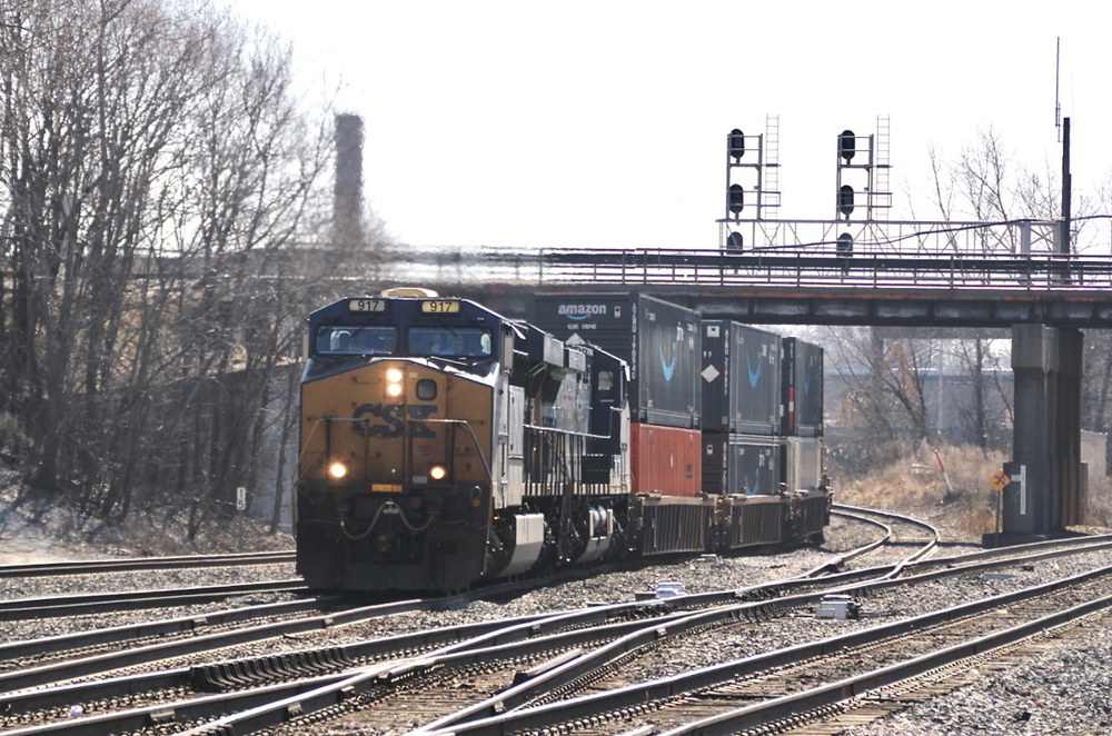Double-stack container train at convergence of several main lines