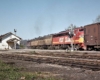Red-and-yellow diesel Rock Island locomotives on freight train
