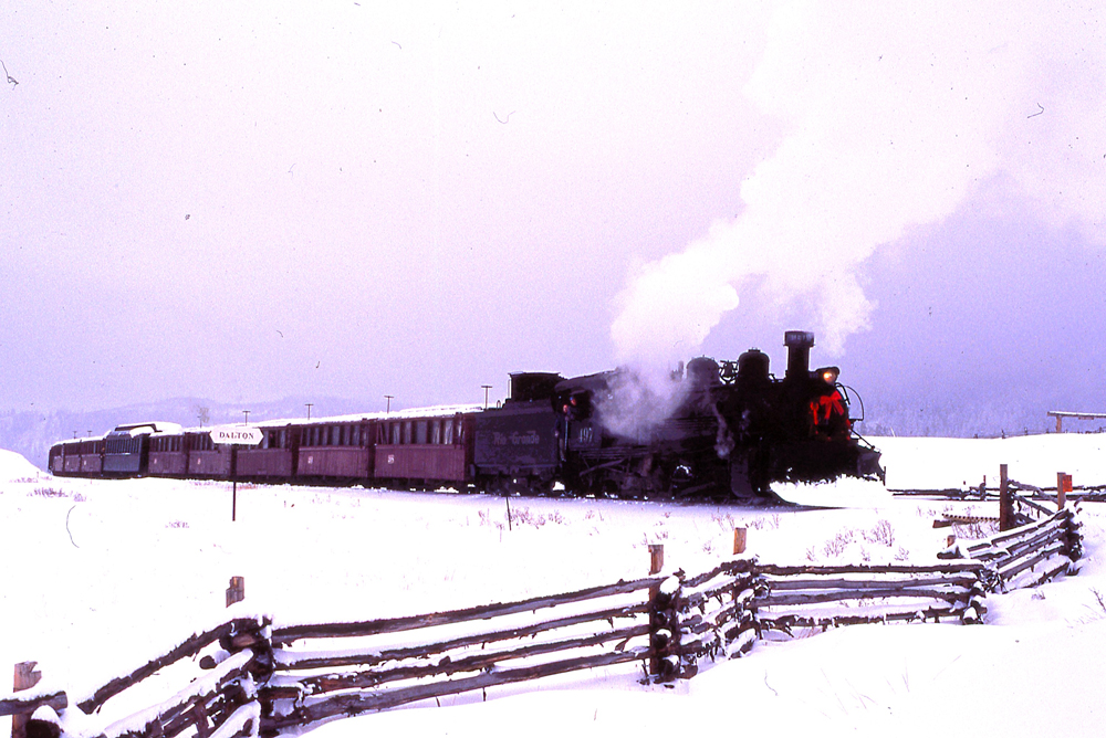 steam engine in snowy landscape