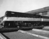 Streamlined steam Chicago & Eastern Illinois locomotives on transfer table outside of shop building