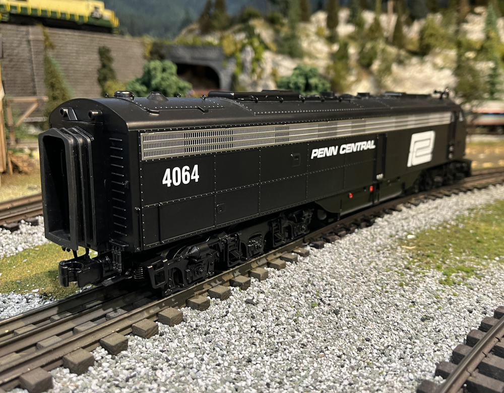 rear of black locomotive on layout