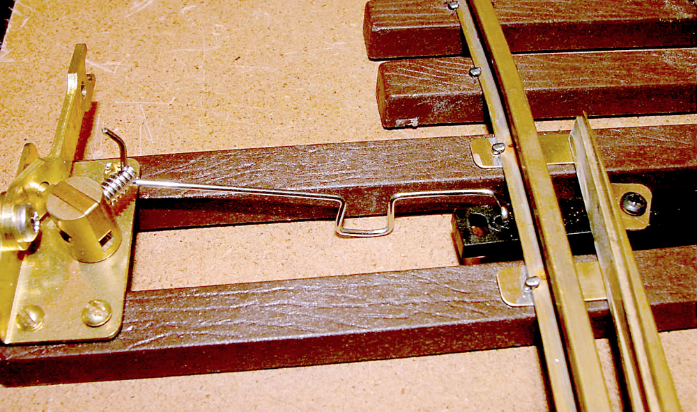 close up of large-scale switch rod: Garden railway construction tips