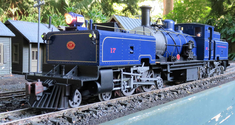 blue and silver model steam engine