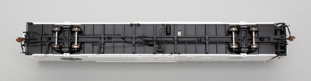 Color photo showing underbody of HO scale freight car. 