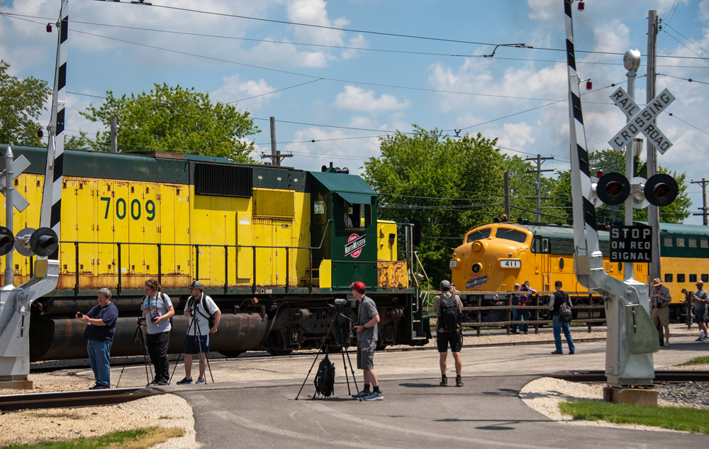 Two trains with Chicago & North Western locomotives